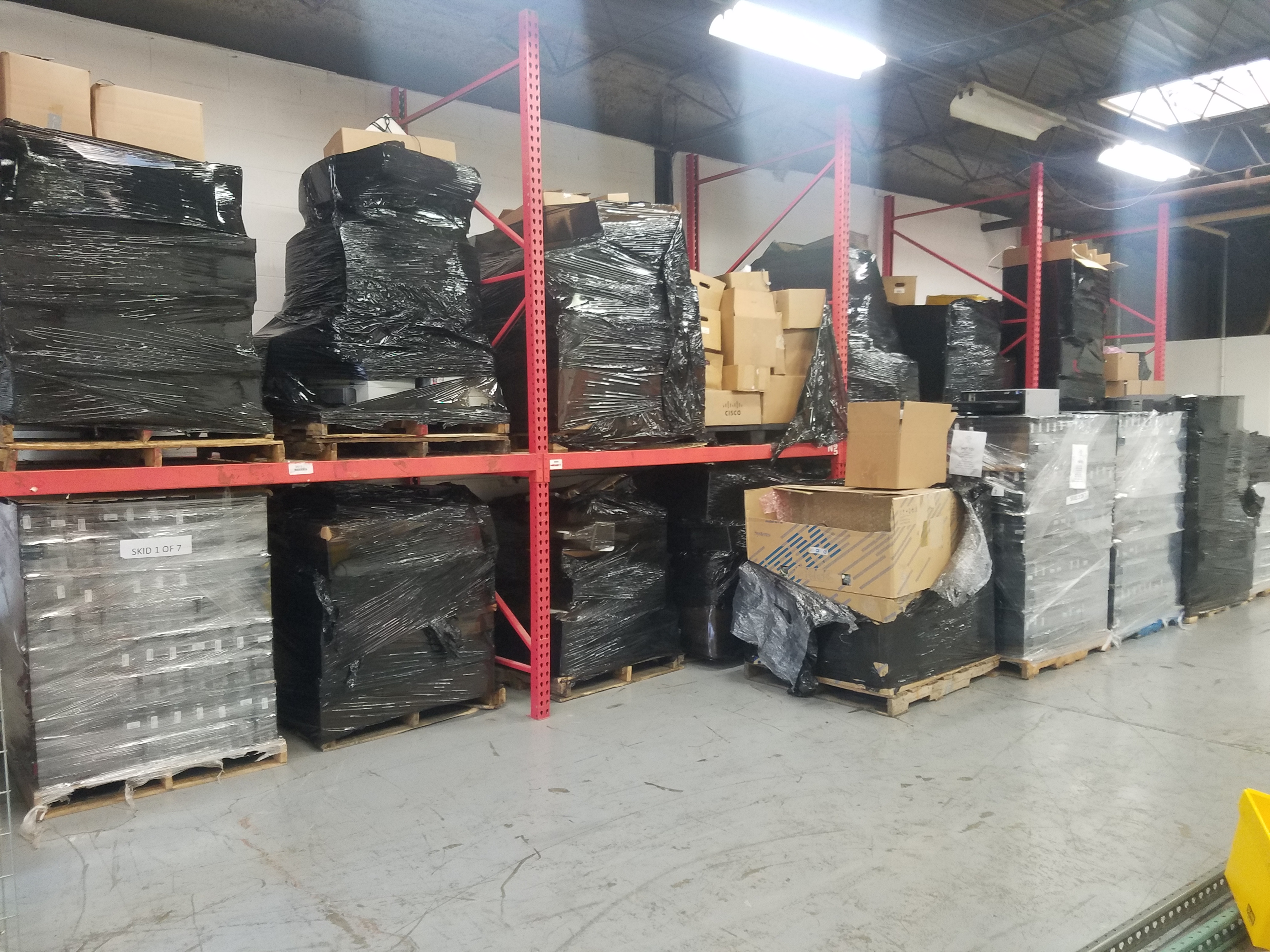 Warehouse shelves with boxed computer parts
